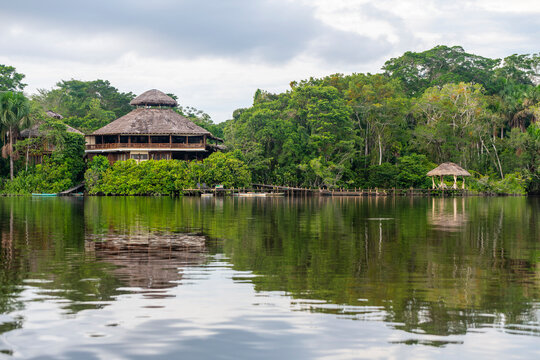Amazon river rainforest lodge reflection, Yasuni national park, Ecuador.