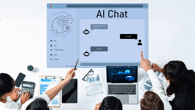 A diverse team engages in a discussion around an AI chat interface, with graphs and analytical data displayed on a laptop, showcasing modern workplace innovation. Trope - Powered by Adobe