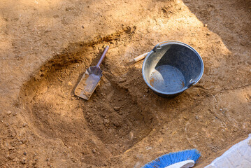 Archaeology Excavation Pit with Bucket and Hand Tools The Concept of Field Work