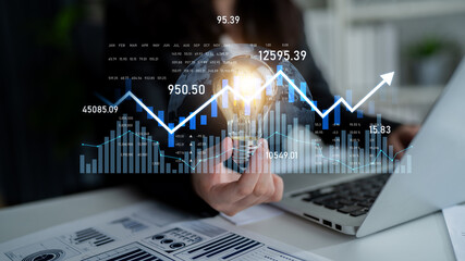 A professional business analyst holds a light bulb symbolizing innovation, alongside financial graphs and data visualization. Perfect for corporate and strategic planning themes. Scalp