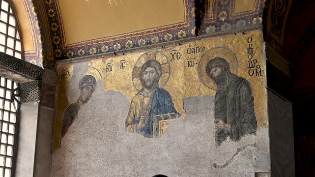 Istanbul,turkey,august 5, 2025. Byzantine deesis mosaic of jesus christ pantocrator with virgin mary and john the baptist in the historic hagia sophia grand mosque