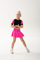 Young dancer with cochlear implant performing expressive sport dance movement. Hearing loss rehabilitation, auditory therapy, assistive technology, physical coordination, and confidence growth