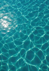 Obraz premium Abstract view of deep turquoise water surface shimmering with strong sunlight reflection. Ideal texture background for tropical design or summer concepts, vacation, empty, swimming