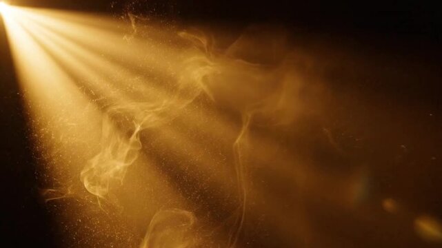 Bright spotlight shining through misty atmosphere creating dramatic effect with golden light rays and dusty particles in dark background