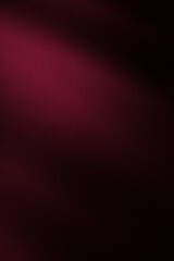 Black dark burgundy cherry red silk satin. Silky shiny fabric. Beautiful elegant background. Light...