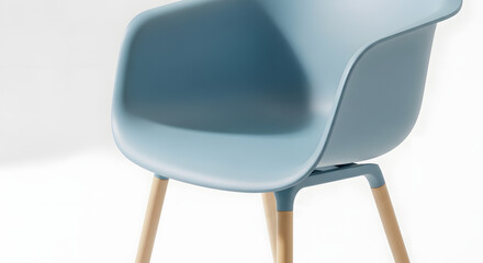 Contemporary light blue molded armchair with curved plastic seat and wooden legs in minimalist design