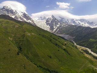 Fototapeta premium Aerial view of Caucasus Mountains and glacier in Svaneti, Georgia