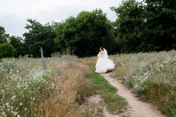 girl are walking in the green hills