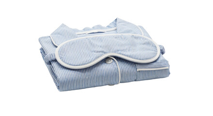 Elegant blue striped pajamas set with sleep mask on a minimalist white background