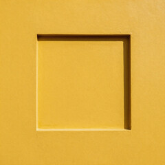 Fototapeta premium An abstract yellow background filled with various square shapes