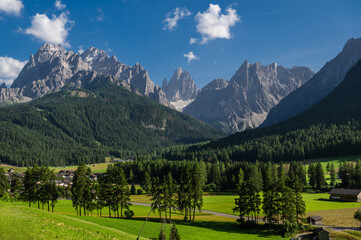 Dolomites Mountain Landscape With Green Fields in Sesto, Italy