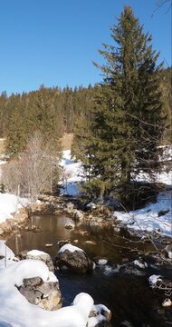 Die Rote Valepp, Abfluss des Spitzingsees in Bavarian Alps. The stream passes under the Valepp hiking trail towards the village and lake.
