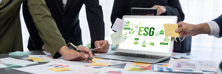 Analyst team use sticky note for creative and analytic brainstorm for business idea with BI data dashboard on laptop screen. Analysis financial data visualization tech for marketing strategy. Prodigy