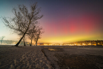 Beautiful night sky with a glowing aurora borealis on January 19, 2025