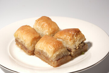 Close-Up of Walnut Turkish Baklava on White Plate