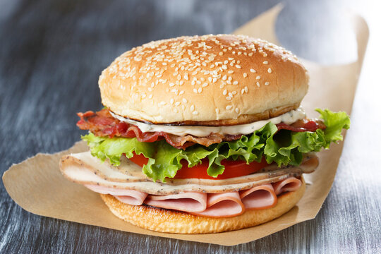 Triple Meat Smoked Turkey, Ham and Bacon Club Sandwich