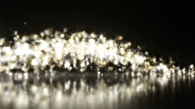 sparkling particulate matter formation in darkness with light reflections