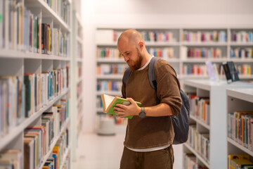 17-year-old teenage boy blow-dries his hair, hair styling, personal care, hair dryer concept