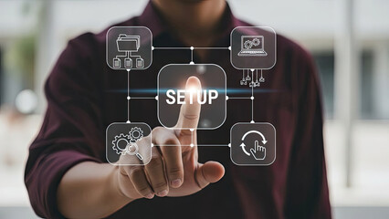 A person touches 'SETUP' on a digital interface with icons for folders, laptop, refresh symbol, and gears, representing the process of configuring and preparing a system or project.