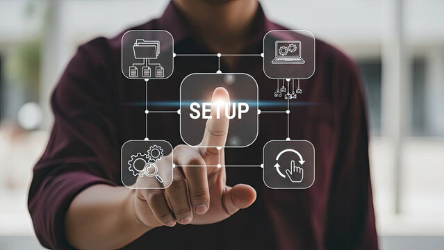 A person touches 'SETUP' on a digital interface with icons for folders, laptop, refresh symbol, and gears, representing the process of configuring and preparing a system or project.