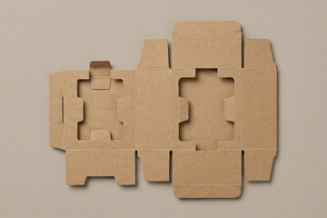 Flat lay top view of an unfolded die cut cardboard packaging template with cutting and folding lines