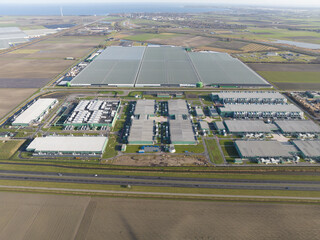 Aerial view modern data center and glass greenhouses