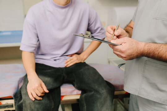 Medical consultation with urologist about urinary symptoms.