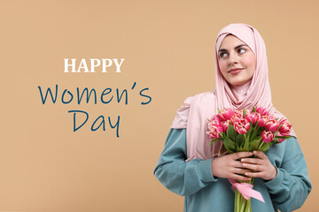 Happy muslim woman in hijab with bouquet of tulips celebrating International Women's day. Dark beige background
