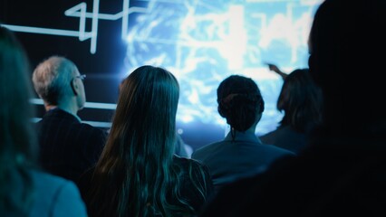 Black female speaker hosts artificial intelligence presentation with data science and AI brain neural networks. Presenter at the convention addresses funding strategy and investments.