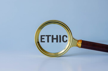 Word ethics made of colourful wooden alphabet against wooden background