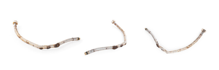 Old rusty metal braided water hose with corrosion and damage isolated on white background. Worn out...