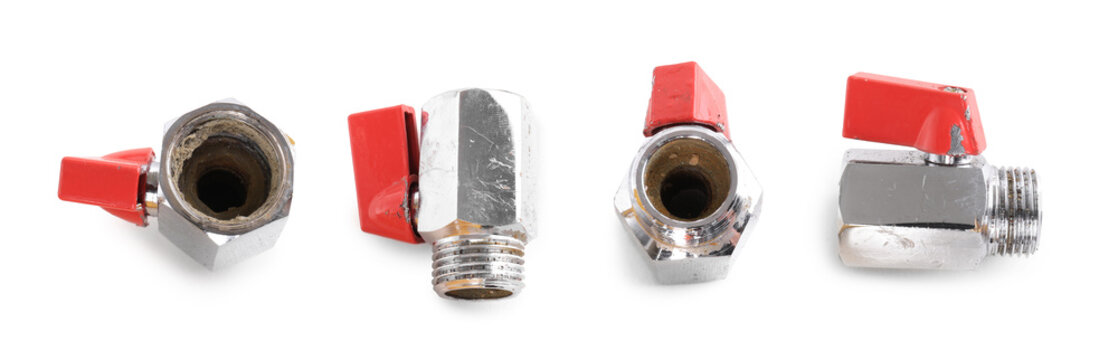 Old chrome ball valves with red handles isolated on white. Set of used plumbing fittings with limescale, rust, and wear, showing different angles for repair concepts.