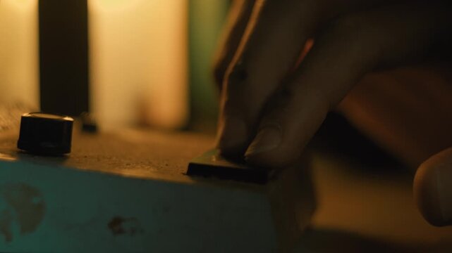 pressing the vintage audio transmitter button