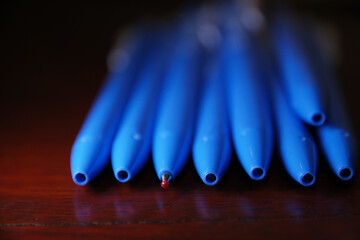 Macro shot of new ball pen with red ball ends