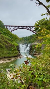 Roaring Waterfall Framed By Cliffs and Foliage (Letchworth State Park, Portageville, New York, USA)