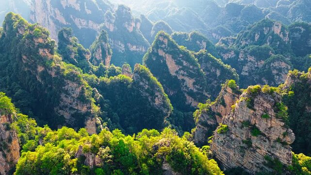 Aerial shot of the majestic sandstone pillars in Zhangjiajie National Forest Park, Hunan, China.