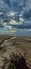 Brazil coast at sunset. Dramatic sky, dark clouds. 