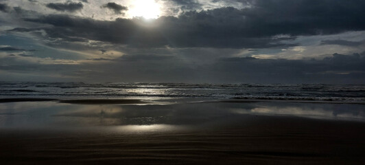 Brazil coast at sunset. Dramatic sky, dark clouds. 