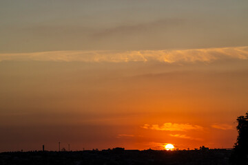 Obraz premium Silhouette of cityscaper buildings during a sunset in Brazil