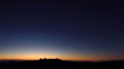 Fototapeta premium Serene Quiet Night Sky Gradient with Calm Colors and Subtle Stars in Seasonal Transition