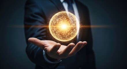 Hand holding a glowing golden wireframe sphere representing data network on a dark technological backdrop