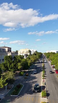 Vertical aerial panorama over Paseo Montejo in Merida, Mexico. Drone rotates left to right. 