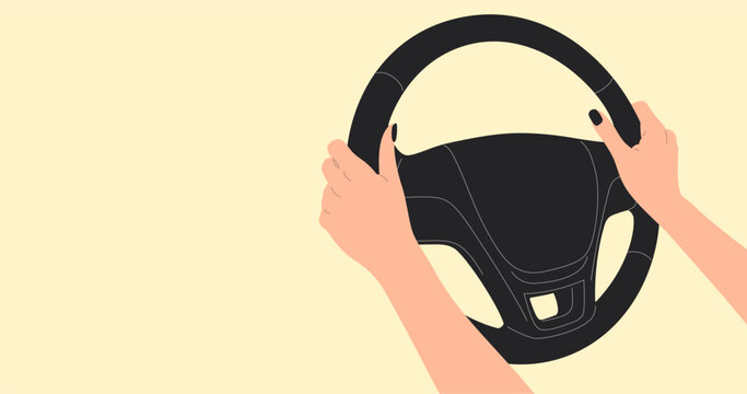 hands on steering wheel of car