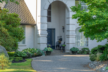 Entrance of luxury house in summer with nice landscape in Vancouver, Canada, North America. Day time on August 2025.
