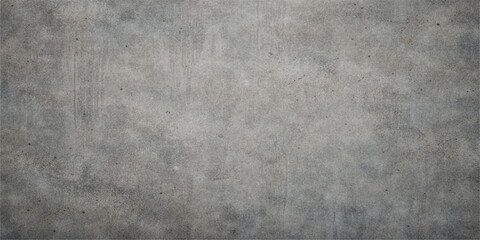 Fototapeta premium A dark and aged concrete wall background with a rough stone surface and dirty grunge metal texture creates a vintage gray backdrop for a retro design