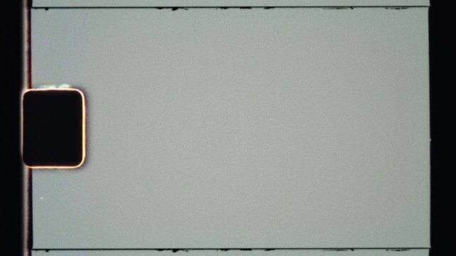 Vintage 8mm Analog Film Overlay with Celluloid Grain, Sprocket Edges, Dust and Worn Film Frame