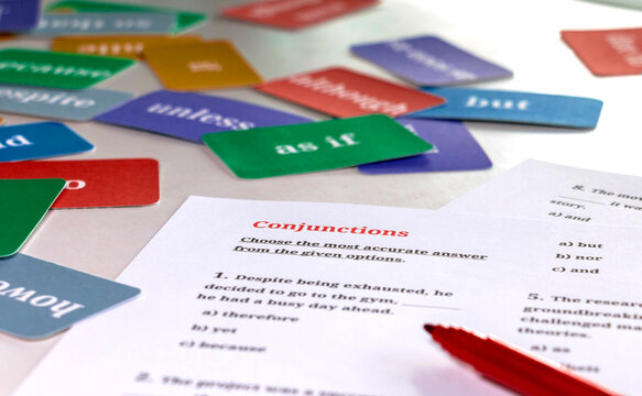 English grammar exam practice sheet and colorful flashcards