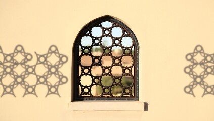 Stained glass window with circular patterns