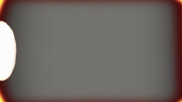 super 8 mm movie frame with film burn effect overlay