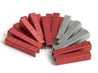 Nails arranged in a semi-circle with red and silver heads on a plain surface viewed from above